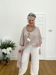 Cover up crinkle pants in cream